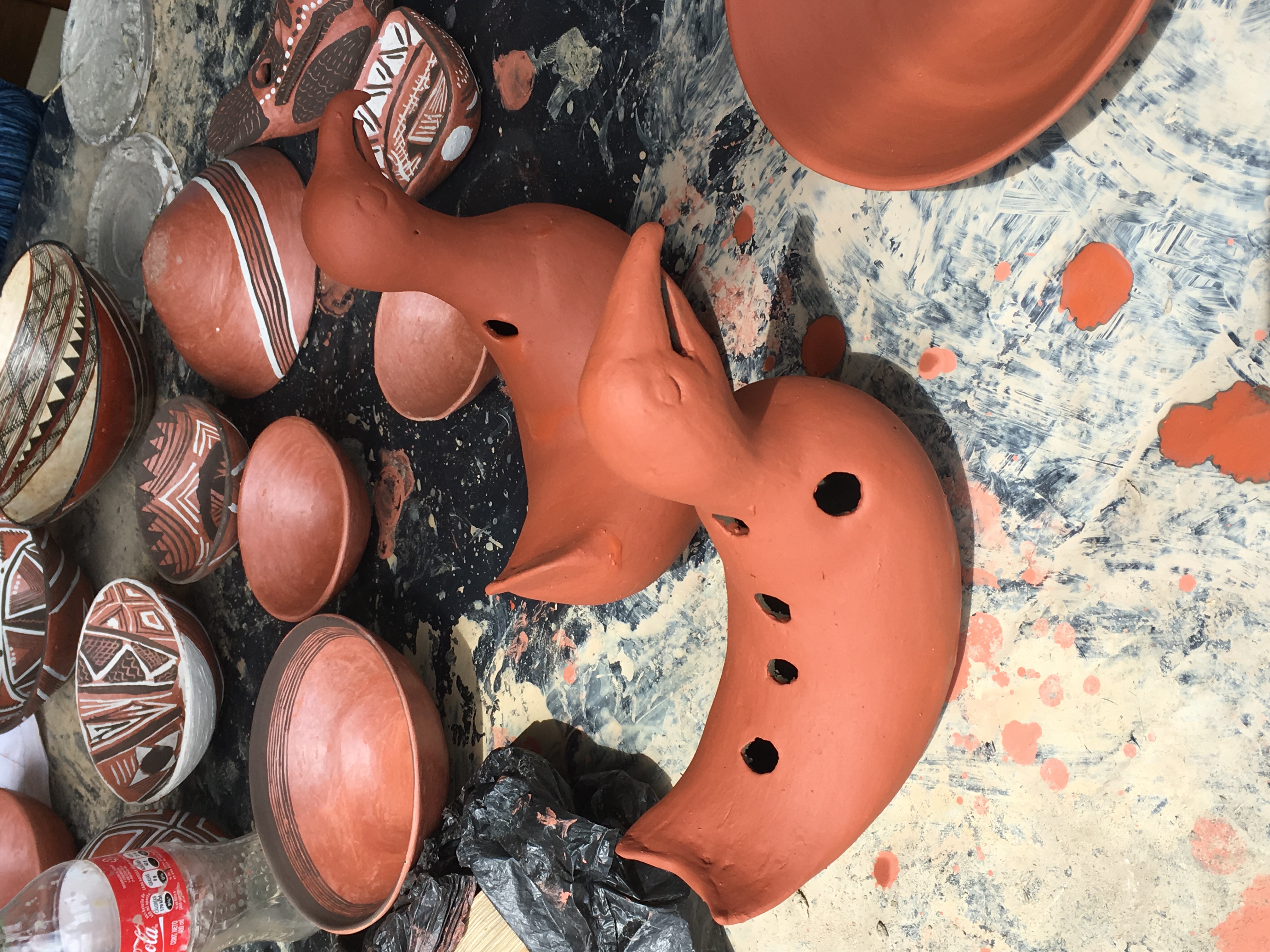 Unpainted bird instrument and miniature mucawas