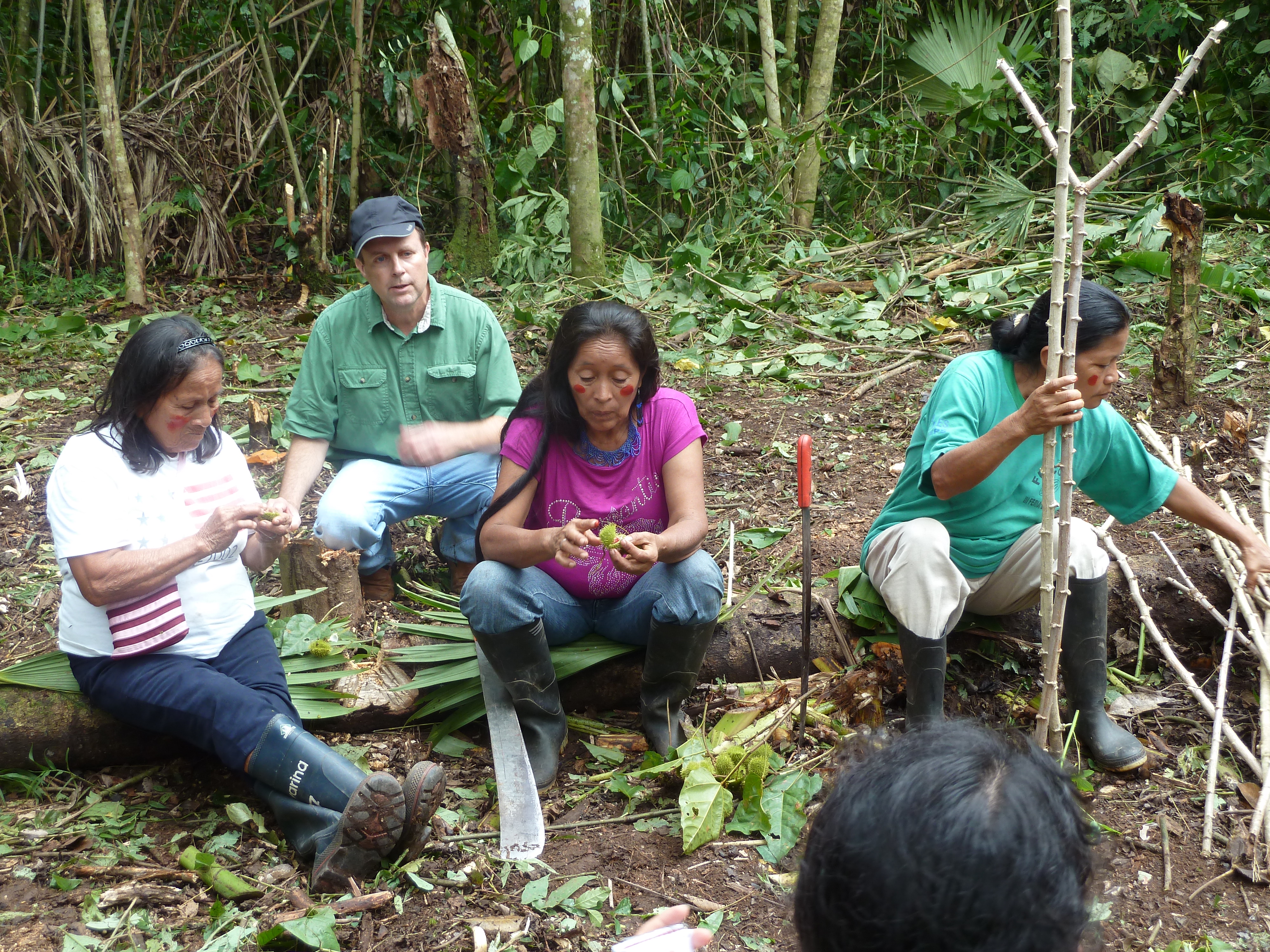 Resting while planting manioc